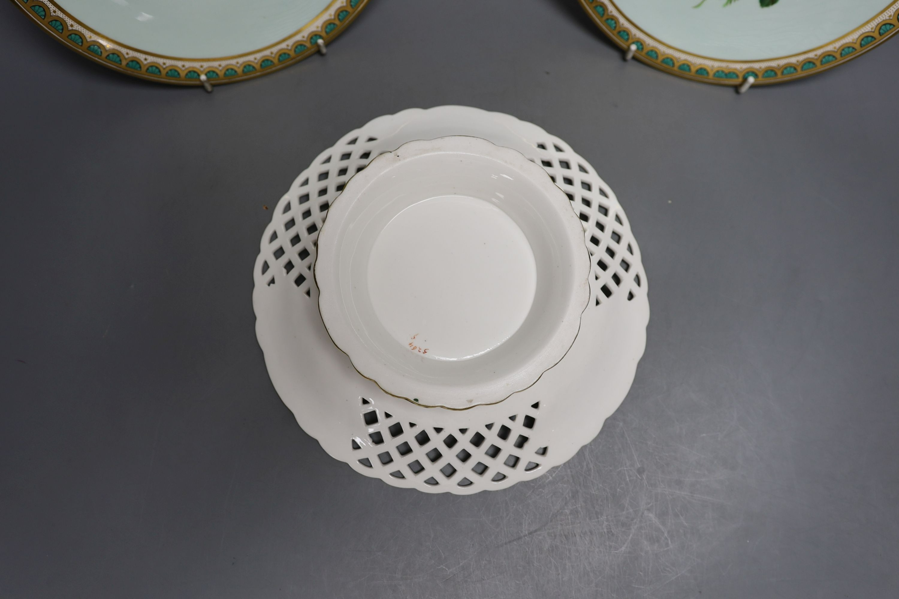 A pair of English bone china cabinet plates and a dessert comport